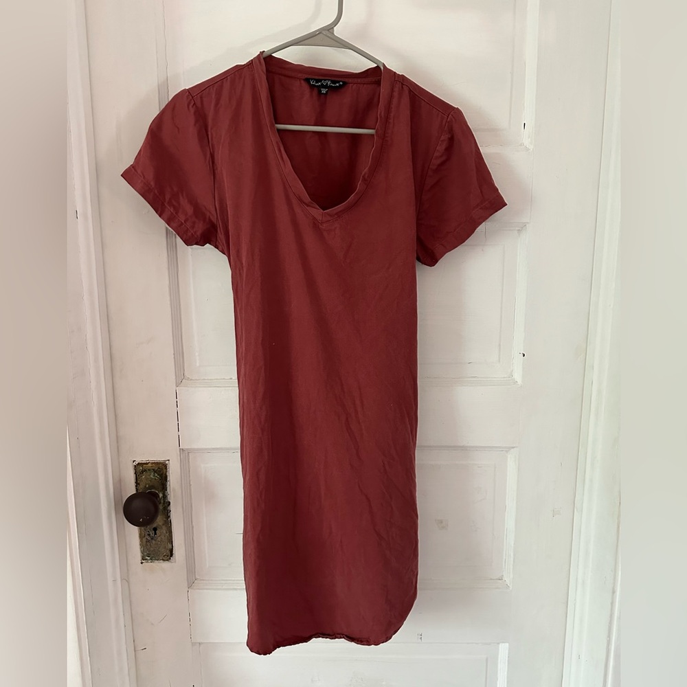 Pink/red dress.V neck, mid thigh/knee length.